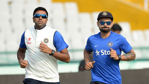 Indias-captain-Virat-Kohli-R-and-teammate-Ravichandran-Ashwin