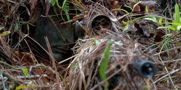 army man face to snake gun photo, 