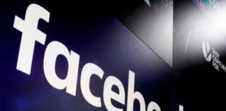Facebook reports increase in users after data-breach scandal