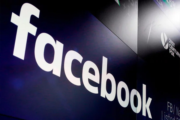 Facebook reports increase in users after data-breach scandal